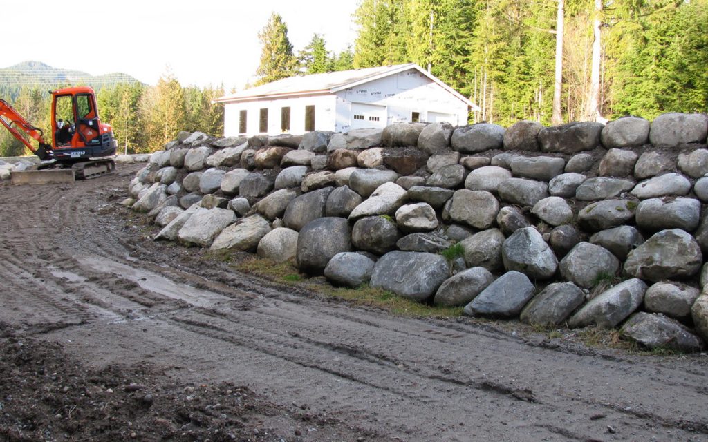 rock wall near drive way
